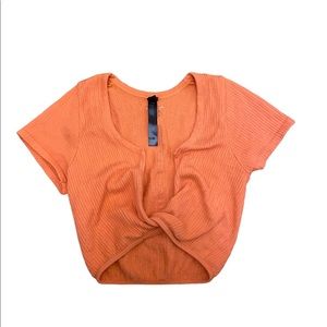 Orange twist crop top